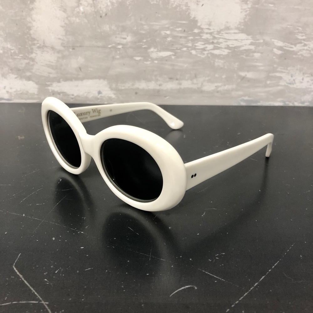 RAEN Figurative Oval Sunglasses